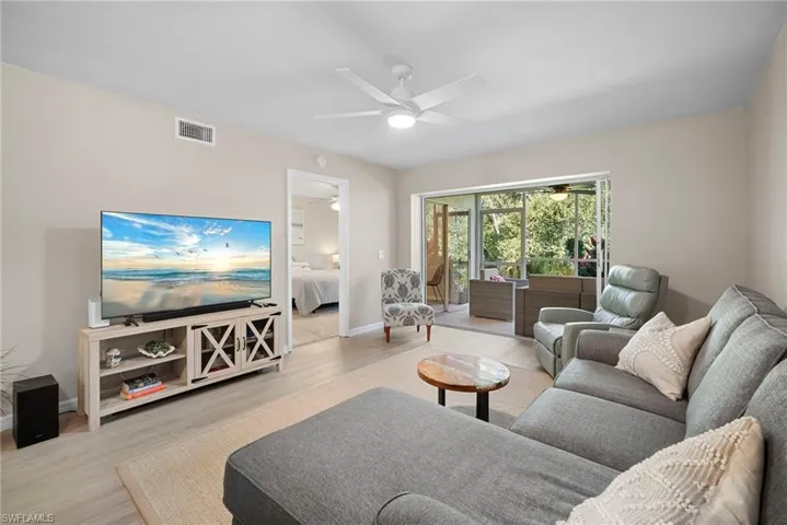 Living area with wood finished floors