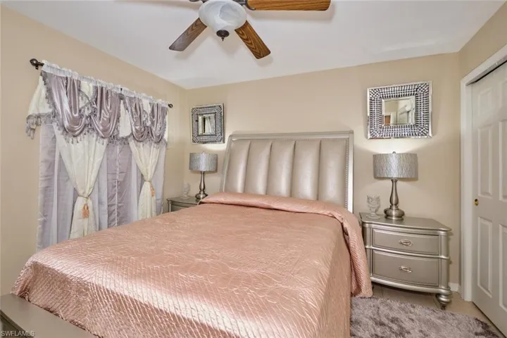 Bedroom featuring a closet and ceiling fan