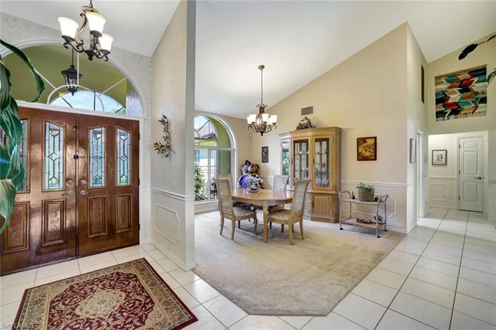 Double door front entry with dining area adjacent