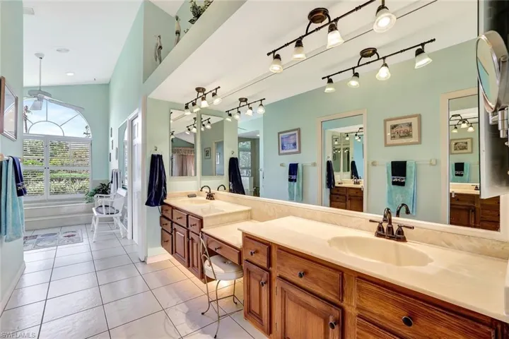 Master bath with dual sinks and dual walk-in closets