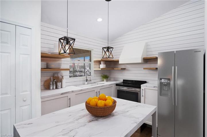 photo includes reality renovation/staging to showcase the possibility of the kitchen. Design services included with purchase!