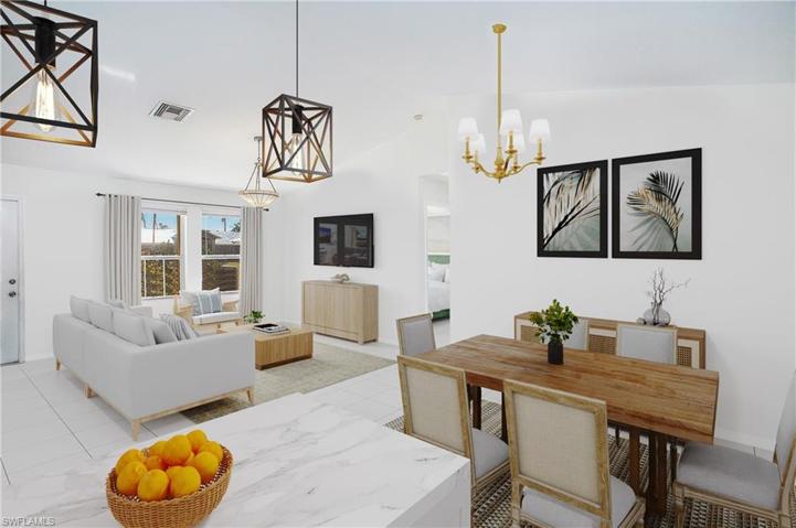 photo includes reality renovation/staging to showcase the possibility of the living and dining area. Design services included with purchase!