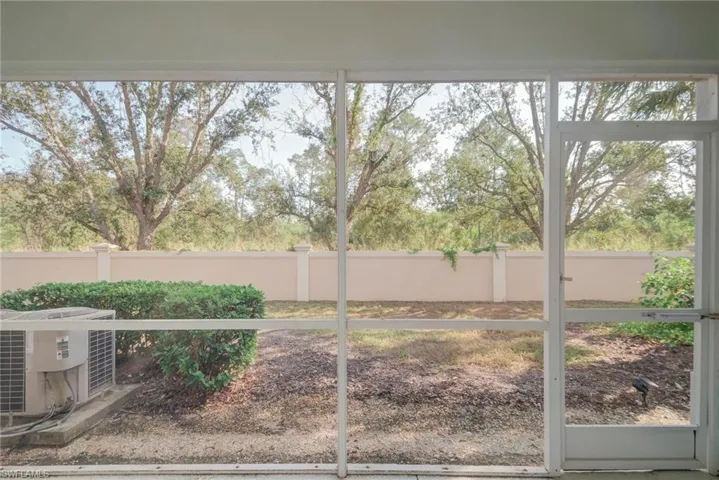 View of yard featuring a sunroom