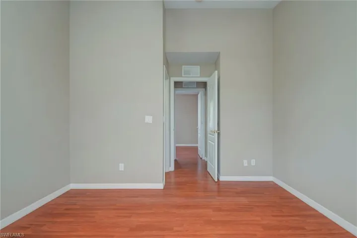 Empty room featuring light wood-style flooring and baseboards