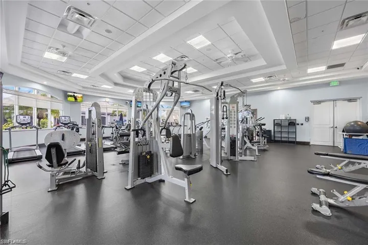 Exercise room with a paneled ceiling