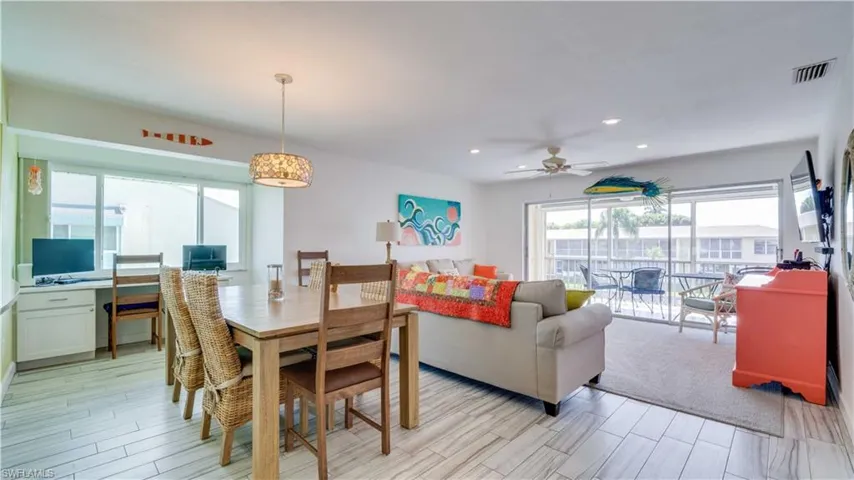 Dining area featuring ceiling fan, recessed lighting, and wood finish floors