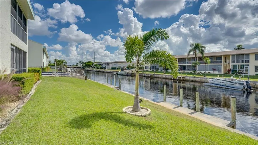 Water view with a dock
