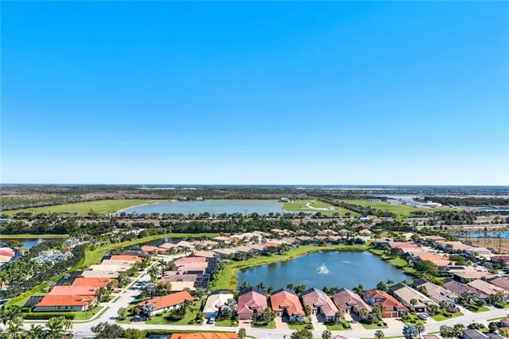 Fantastic East Exposure lake views with beautiful tropical landscaping