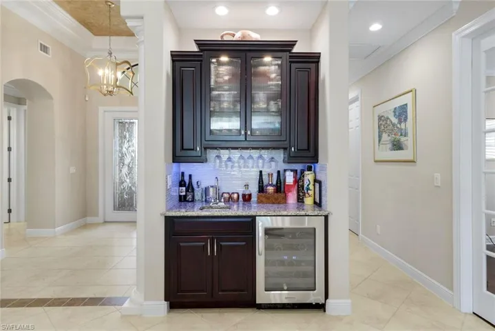 Wet Bar- with a wine cooler- great space to start the fun while entertaining family and friends.