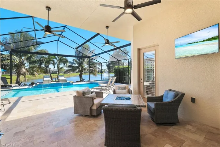 The perfect new resort lanai living space/ travertine deck
