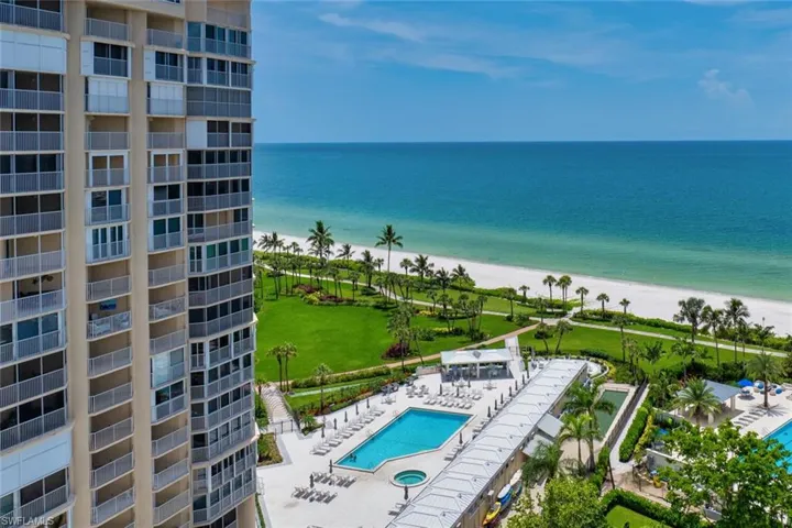 Birds Eye closet up View of Gulf, Pool setting, Cabanas, Grills, Bocce (behind Cabanas) and Convenient Beach Storage!