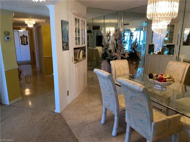 Separate Dining Area (which has been Converted by other units as a 4th Bedroom/Office Flex space should New Owner require additional space!