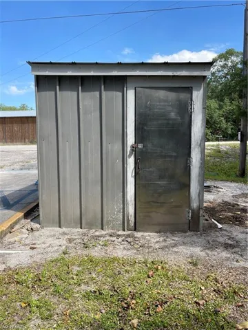 View of shed with fence