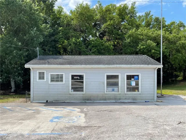 Garage with view of scattered trees