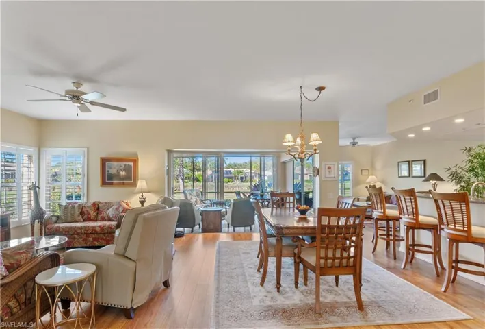 Open floor plan and beautiful view of lake and golf course.