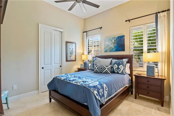 Guest suite designed for comfort and style, natural illumination, and a calming atmosphere.  Plantation shutters, neutral flooring and generous space!