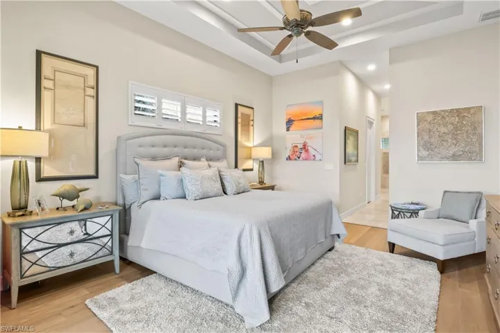 Spacious suite designed for relaxation, with premium flooring and a seamless connection to the outdoor oasis.