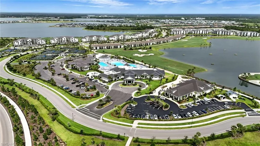 Aerial view of property's location with a nearby body of water