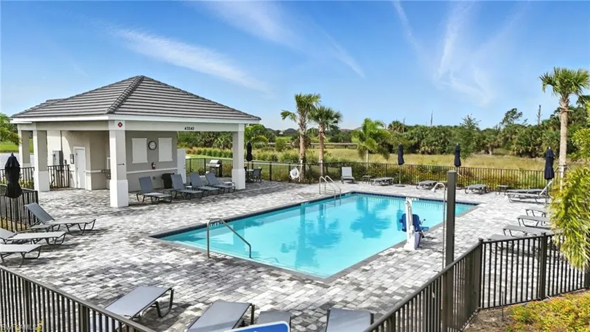 Community pool featuring a patio area