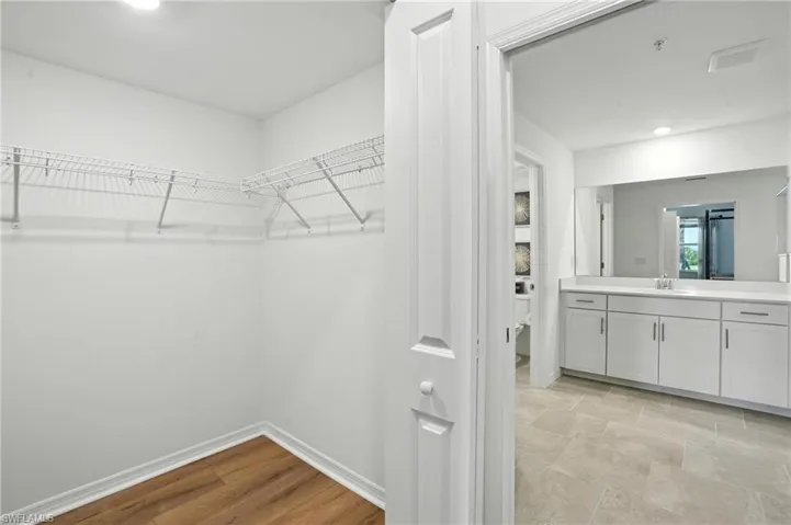 Walk in closet with a sink