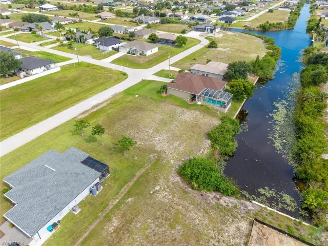 Expansive vacant lot featuring frontage along a navigable canal