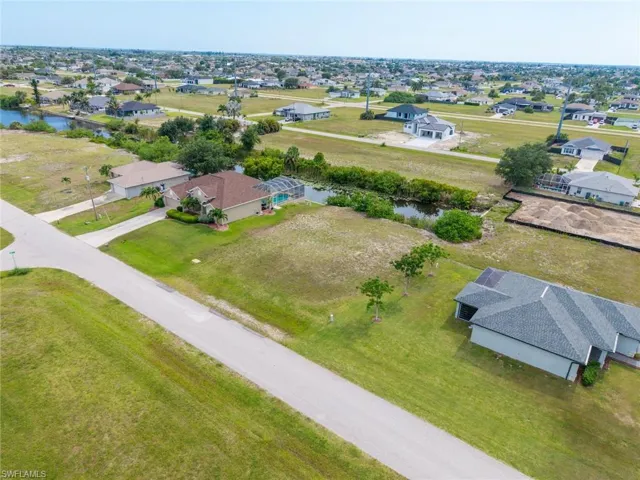 Residential neighborhood with established homes and undeveloped lots
