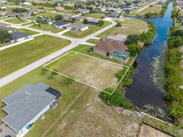 Cleared land parcel with canal frontage