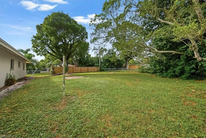 View of fenced backyard