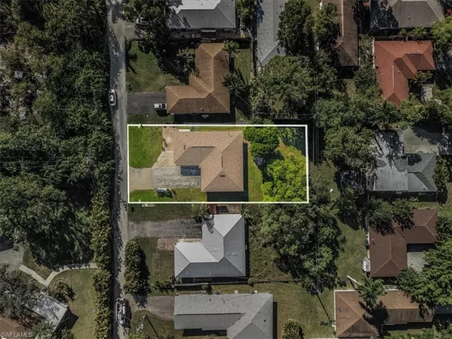 Aerial overview of property's location with nearby suburban area and property boundaries highlighted