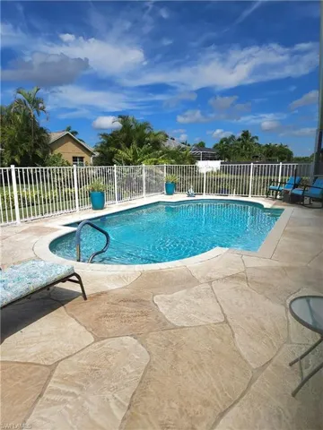 View of pool featuring a patio area with plenty of room for loungechairs