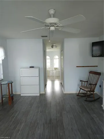 The spacious primary bedroom leads to 2 large walk-in closets and the en-suite bathroom.