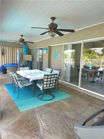 2 outdoor ceiling fans in this 27x10 foot covered lanai
