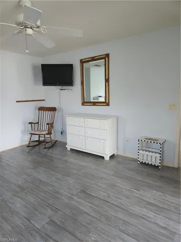 The spacious primary bedroom is located in the rear of the home.