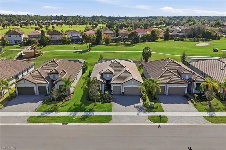 Aerial view of residential area with a golf course
