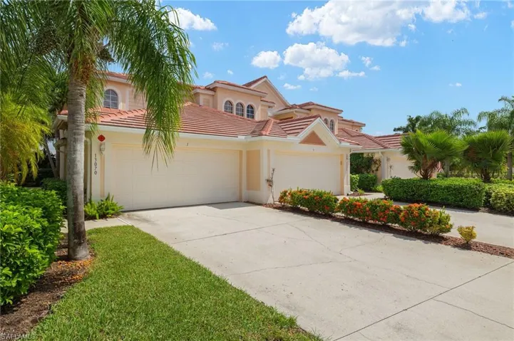 1st Floor End Unit w/2 Car Garage