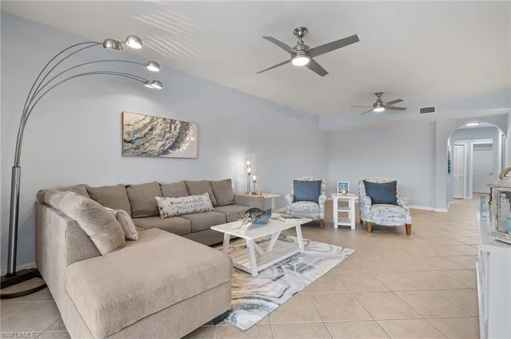Living room w/ updated fan/light fixtures