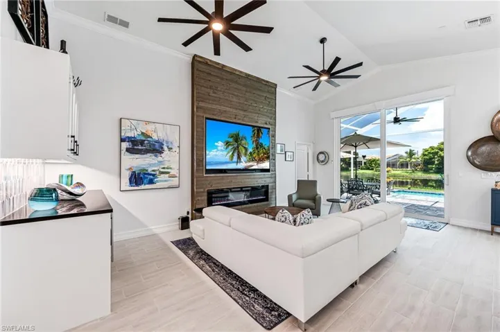 New built-in 85" TV and electric fireplace
