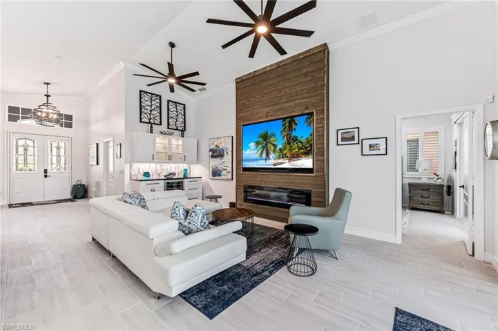 Bright & airy living space with new lighting and fans