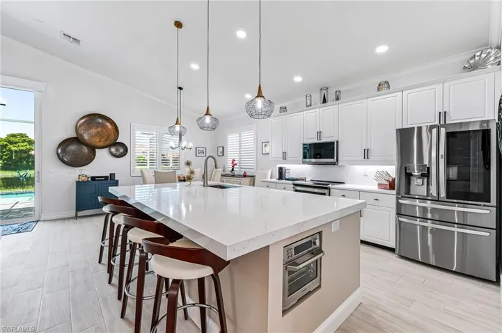 Eat in kitchen with water views and extra seating at the island center