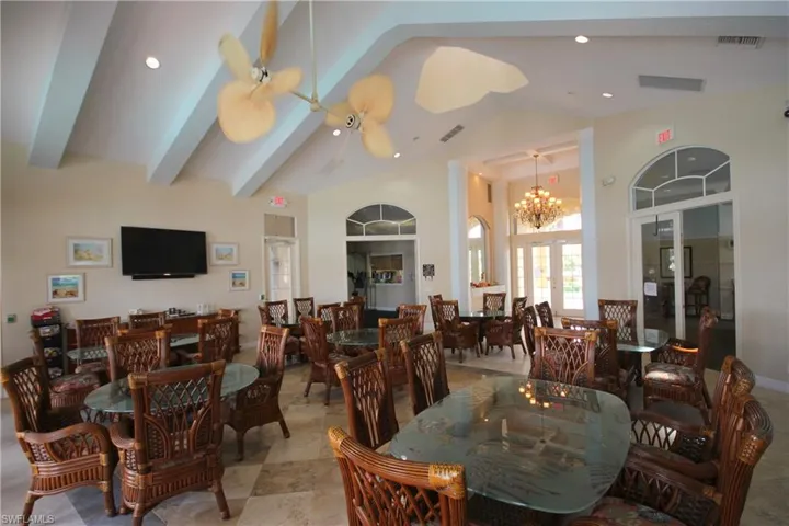 Inside the community clubhouse with flat screen TV and Full Kitchen