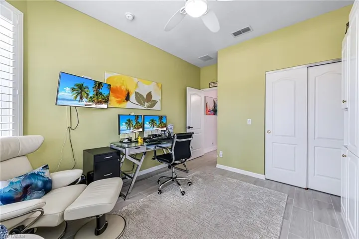 Bedroom/Office with murphy bed and full closet