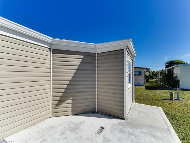 Patio on side of the home ready for your grill
