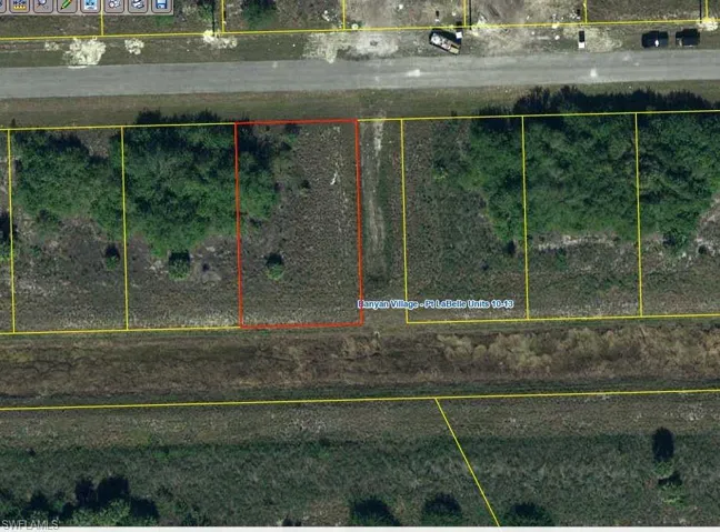 Aerial overview of property's location featuring property boundaries highlighted