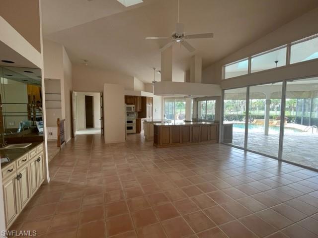 Living room opens to the kitchen and lanai