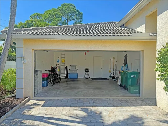 Garage with decorative driveway