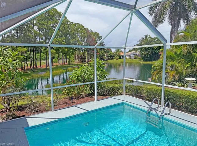 Screened outdoor pool with long lake view