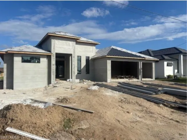 View of front facade with an attached garage