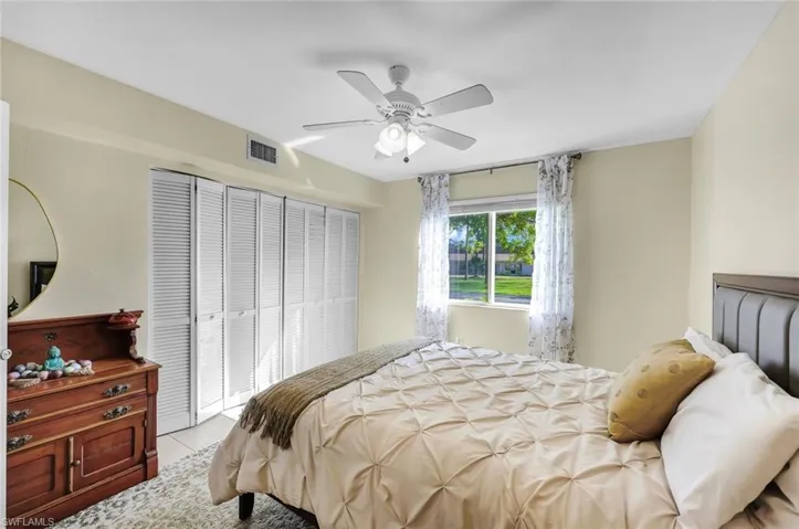 Spacious, long closet for ample storage and offers serene views of the beautifully landscaped, creating a tranquil setting to relax and unwind.