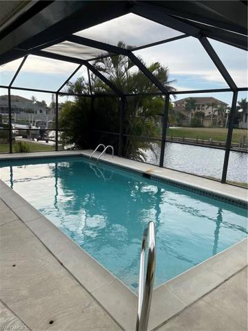 Pool overlooking waterfront and sunsets
