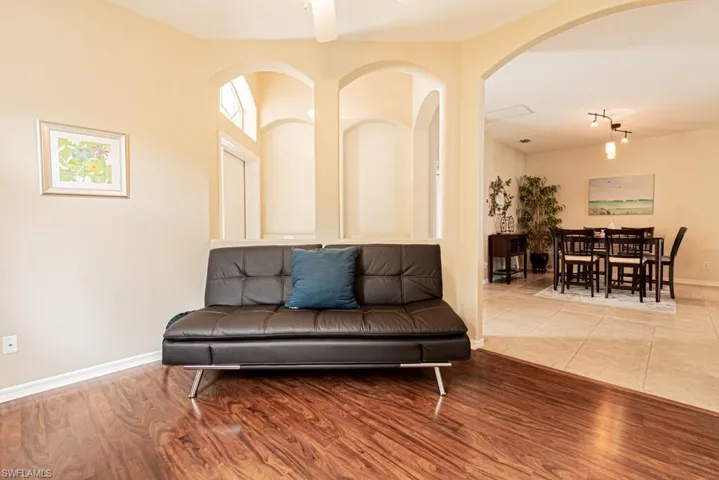 Living room with hardwood / wood-style floors